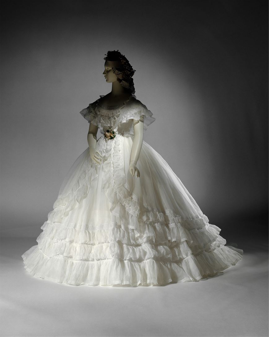 Traditional French Wedding Dress from 1864 Image Credit: Metropolitan Museum of Art’s Costume Institute
